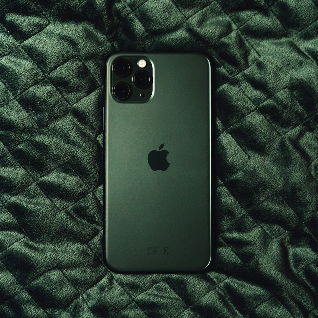 iPhone 11 Pro Max in white studio